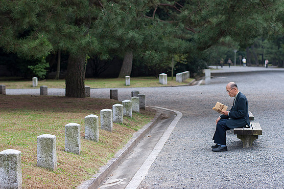 Man on a bench, Kyoto, Japan