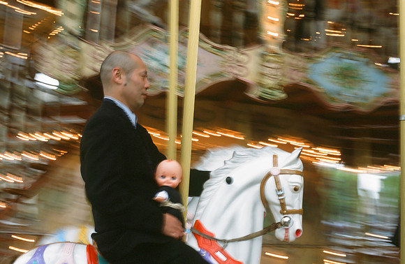 Man on Carousel, Paris